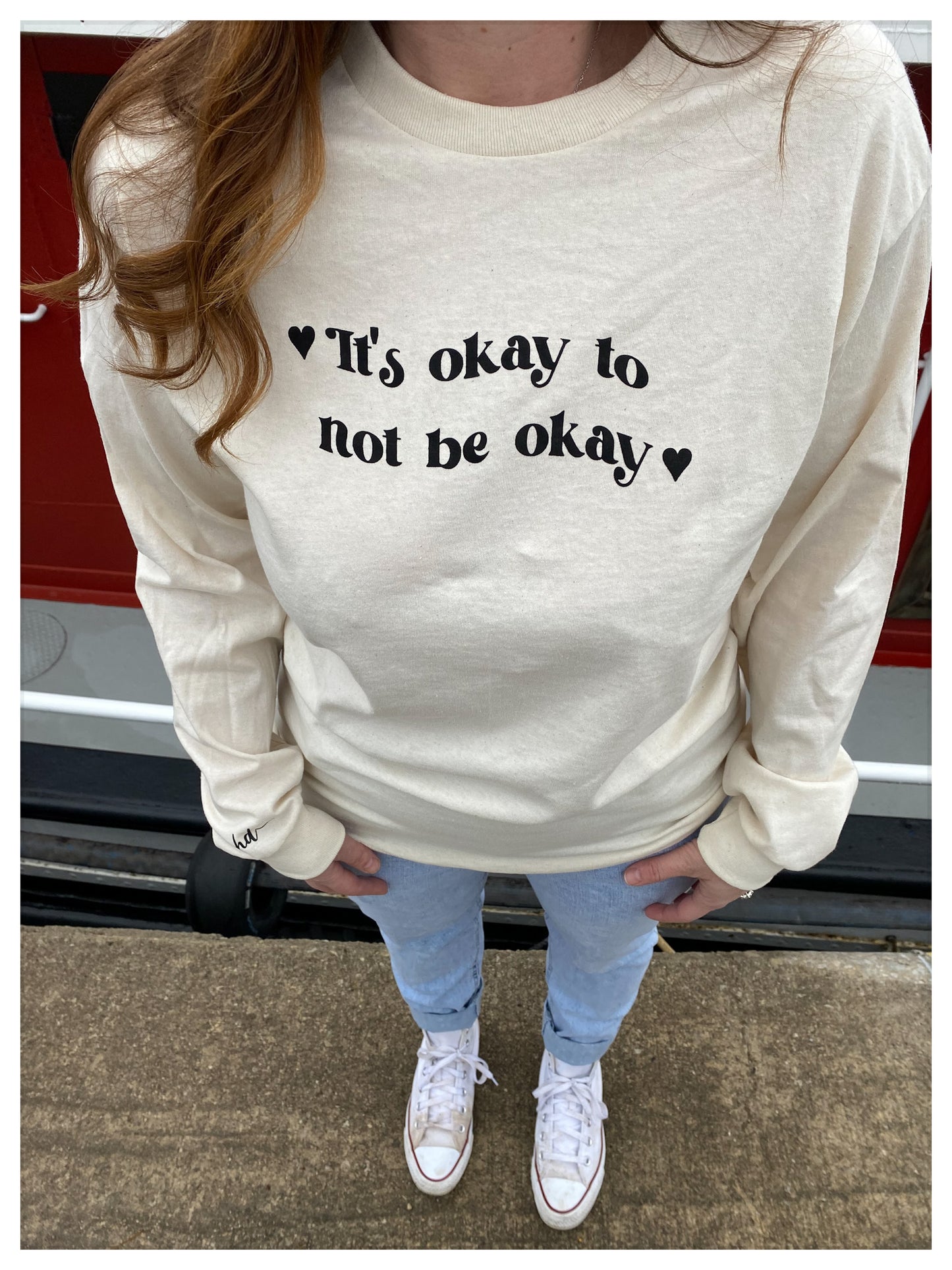 Close up of shirt design "It's Ok To Not Be Ok "